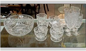 Collection of Glass Comprising 6 Sundae Glasses, with star cut bases, 5 Champagne Flutes. one bud