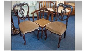 Pair of Edwardian Carved Mahogany Salon Chairs, on cabriole legs with unusual heart shaped backs,