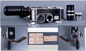 Paillard Bolex B8 8mm Movie Camera With Pistol Grip. 12.5mm lens, plus 11-24mm interchangeable,