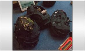 Three Large Holdhalls/Rucksacks. Containing a quantity of military related kit. Looks to be