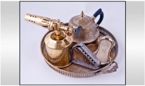 A Miscellaneous Lot comprising brass Swedish blow torch, four brass ashtrays and a plated tray and