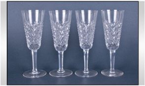 Waterford Fine Cut Crystal Set Of Four Colleen Champagne Flutes. Each 7.25 inches high. All pieces
