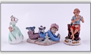 Lladro Figure Group of a boy lying down reading `Reading Buddies`. Together with Coalport Figure `