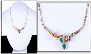 Ladies 18ct Yellow Gold, Emerald And Diamond Set Necklace. Featuring 2 oval cut emeralds of good