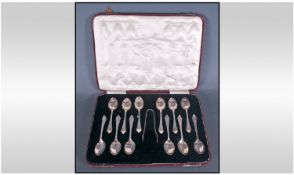 Boxed Set Of 12 Teaspoons And Matching Sugar Nips, Marked FC&Co, Silk Lined Fitted Case.