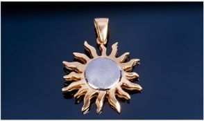 18ct Gold Sunburst Pendant Drop. Fully hallmarked 750. Height 1.5 inches. 12.3 grams.