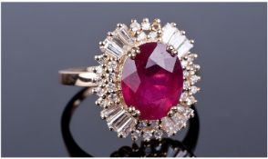 14ct Yellow Gold Diamond & Ruby Ring, Set With A Large Central Oval Cut Ruby (Estimated Weight 5.