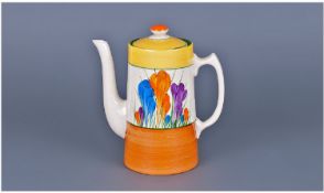Clarice Cliff Hand Painted Lidded Coffee Pot. `Crocus` design. Date 1929. Stands 7 inches high.