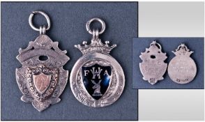Two Silver Fob Medals.