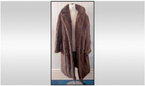 Ladies Fully Lined Full Length Dark Mink Coat, with cuff sleeves and slit pockets. Hook and loop