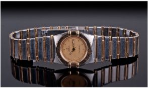 Omega Constellation Brushed Gold And Steel Ladies Wrist Watch. Number 6104/465. Complete with box.