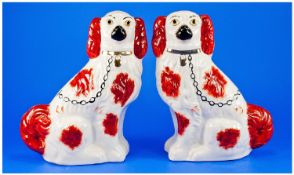 Two Staffordshire Flat Back Spaniel Figures. Brown and cream. 12 inches tall.