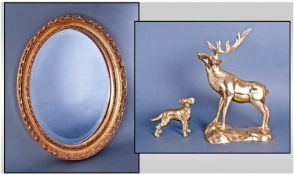 Large Brass Figure Of A Stag together with brass dog figure & oval gilt framed mirror.