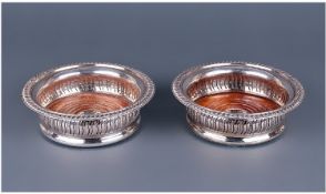 Barker And Ellis Good Quality Pair Of Silver Plated Wine Coasters. Circa 1920. Each 2 inches high,