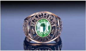 10ct Gold American Collage Ring. Set with central green Faceted stone, marked Sachem High School `