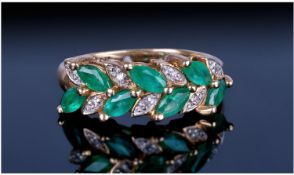 Ladies 9ct Gold Set Diamond And Emerald Dress Ring. Marked 9kt and diamond.