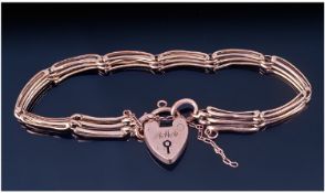 Early 20th Century 9ct Gold Gate Bracelet. With padlock fastener. Marked 9ct tab.