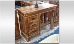 A Teak Knee Hole Type Side Cabinet, with a bank of three draws down one side, with an open appiture