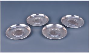 A Collection Of Four Sterling Silver Small Dishes. Each inset with a silver Churchill crown coin,