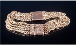 Victorian Ornate 9ct Gold 5 Chain Tazzell Bracelet. The integral padlock in the form of a hinged