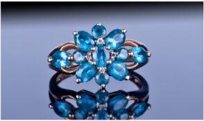 9ct Gold Blue Topaz Cluster Ring. Fully hallmarked. Ring size J.