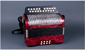 Hohner Double Ray Accordian, in hard case. Together with A Beginners Guide to the Irish Traditional