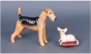 Two Beswick Dog Figures. Cast Iron Monarch, plus one other.