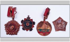 Set of Four Medals.