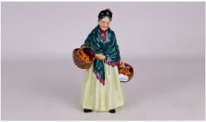 Royal Doulton Early Figure `The Orange Lady`. HN 1953. Issued 1940-1960. 8.5 inches tall. Mint