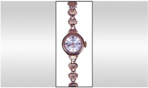 Rotary 1970`s Ladies 9ct Gold Case Wrist Watch, with integral 9ct gold bracelet. Fully hallmarked.