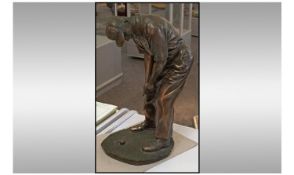 Bronzed Golfing Figure, 17 inches in height.