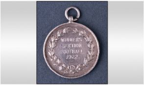 Silver Fob Medal. Laurel Wreath moulded front. Engraved ``Winners Section Football 1922`` Diameter