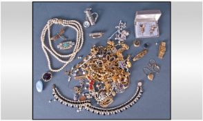 Small Collection Of Costume Jewellery including brooches, necklaces etc.