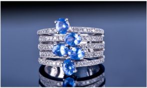 14ct White Gold Tanzanite And Diamond Ring, Set With Five Oval Cut Tanzanite`s Set Between Five