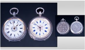 Two Silver Fob Watches. Both with white enamel dials and Roman Numerals. 38mm silver cases. Both