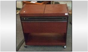 Ekco Dark Wood Hostess Trolley. Fitted with interior shelving. Height 27.5 inches, width 29 inches,