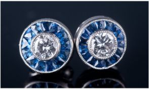 Art Deco Circular Shaped Pair Of Diamond And Sapphire Earrings. The diamonds and sapphires of very