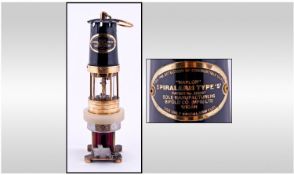 Brass Spiralarm Miners Lamp. Label reads  `Naylor Spiralarm Type `S` patent no 352267. Sole