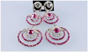 Pair of Pink and White Crystal Statement Earrings, long drops formed from circles within circles,