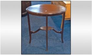 Edwardian Mahogany oval shaped inlayed occasional table Square splayed out legs with a platform