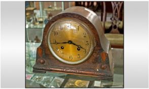 1930`s Rounded Top 8 Day Mantle Clock brassed dial in an oak case.