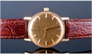 Omega Automatic Gents 9ct Gold Cased Wrist Watch. Fitted on a tan leather strap. Circa 1950`s.