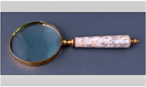 Hand Held Magnifying Glass, with mother of pearl handle. Length 10 inches.