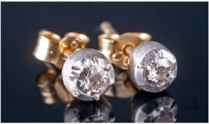 18ct Gold Set Pair Of Diamond Stud Earrings. Estimated weight 0.30 pts.