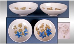 Moorcroft Small Footed Bowls. Blue flowers on cream ground. c 1960`s.  4.5 inches in diameter.