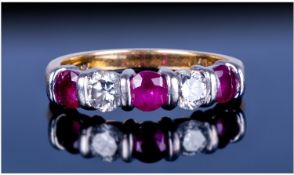 Ladies Modern 18ct Gold Set 5 Stone Ruby And Diamond Ring. The diamonds of good colour and clarity.
