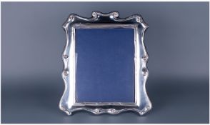 A Fine And Large Modern Silver Shaped Photo Frame. Hallmark Sheffield 2001. Height 14 inches,