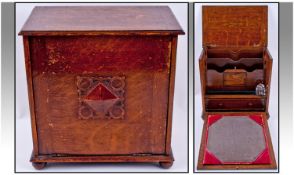 Victorian Drop Down Oak Stationary Cabinet, with fitted interior. Raised on four ball feet. 12.25