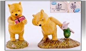 Royal Doulton Winnie The Pooh. 1, Winnie the Pooh and the present. 2, Winnie the Pooh and Piglet.