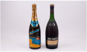 Two Bottles Of Unopened Champagne. Remy Martin Cognac and B. Parmanter.